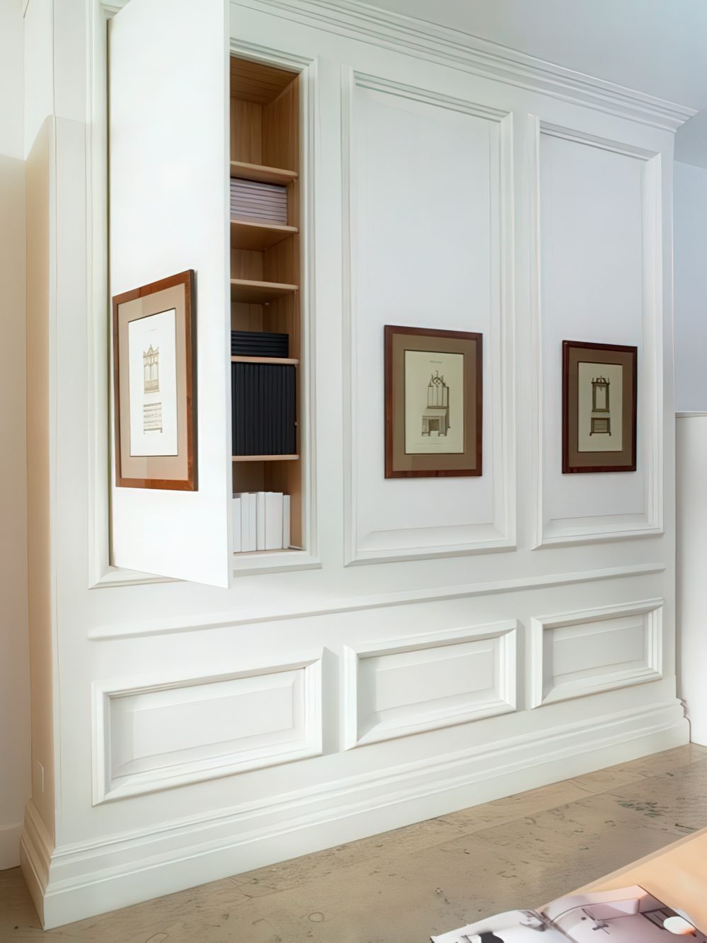 storage units hidden behind wall panels will hide your wi-fi router, too, and your room will be elegantly decluttered.