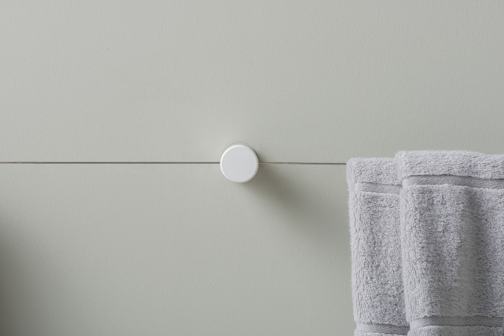 The design is simple and is inspired by usual black dots.