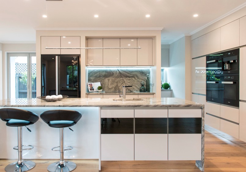Try a black glass door fridge to add a contemporary feel to your minimalist kitchen and create a contrast.