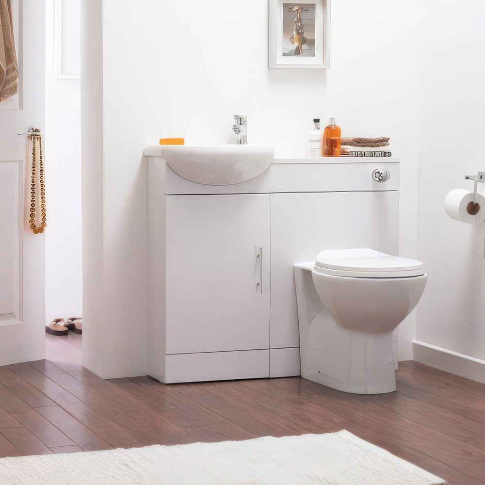 White vanity, sink and toilet combo.