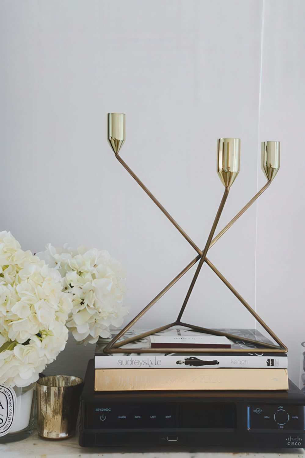 Make your wi-fi router part of decor - it's an easy and fast solution and it won't block the signal.