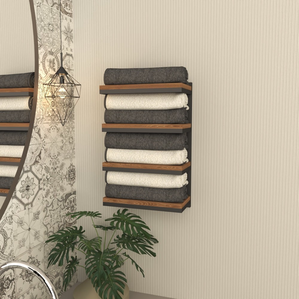 This one’s for when you’ve got a lot of towels and want them off the floor. It’s giving “I have guests over and everything is organized, don’t look under the sink though.”

(@grandmix.store).
