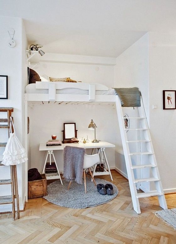 A light-filled contemporary teen bedroom with a working space below and a sleeping one above.