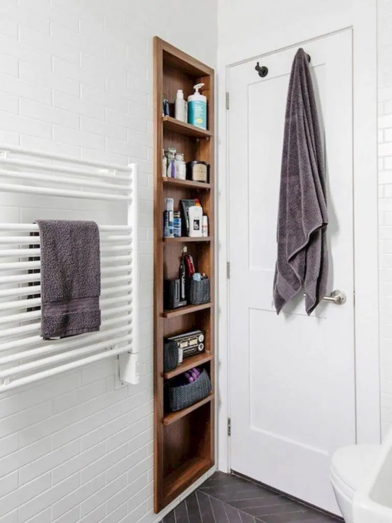 A built-in niche is the sleekest idea for any space, even if it's quite shallow, it can still be tall.