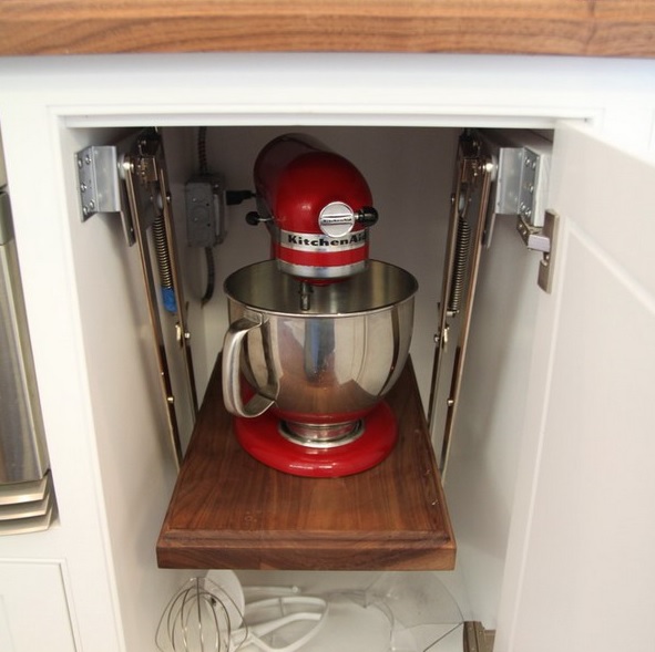 A cabinet with a retractable shelf and a mixer there will keep any eye-sores away.