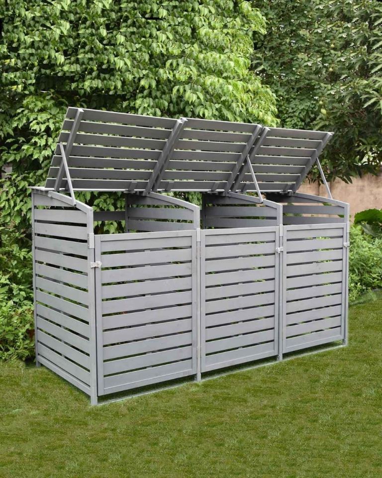 This large box features three compartments where you can put trash cans for different types of litter.