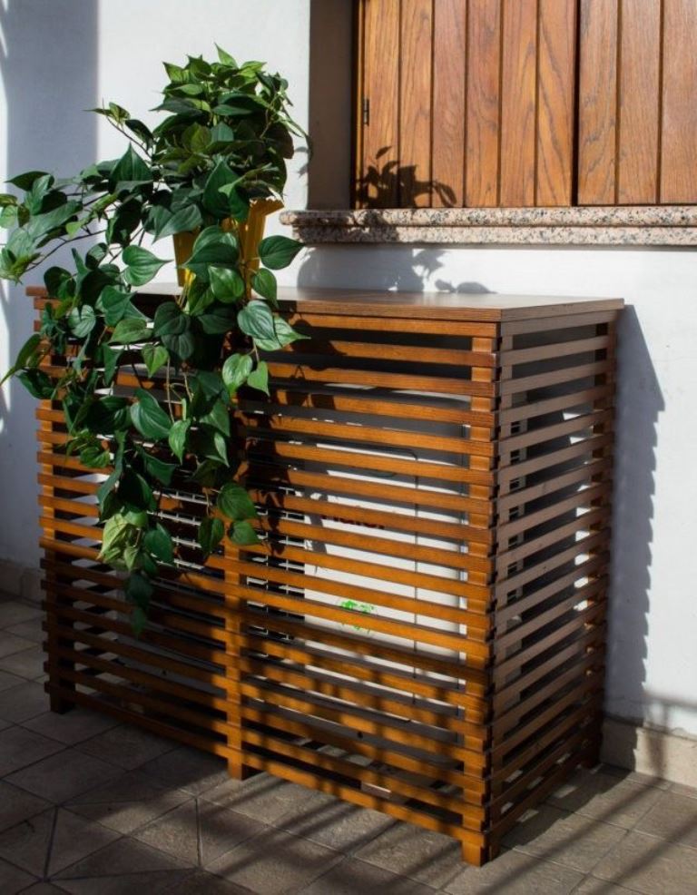 Making slatted boxes will allow the air flow but keep the top solid to protect the piece from rain and too much sun.