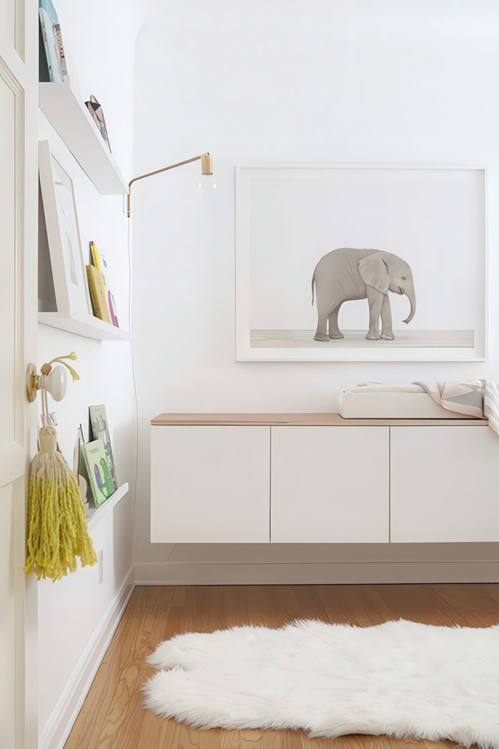 Hanging IKEA Besta unit with a wooden tabletop.
