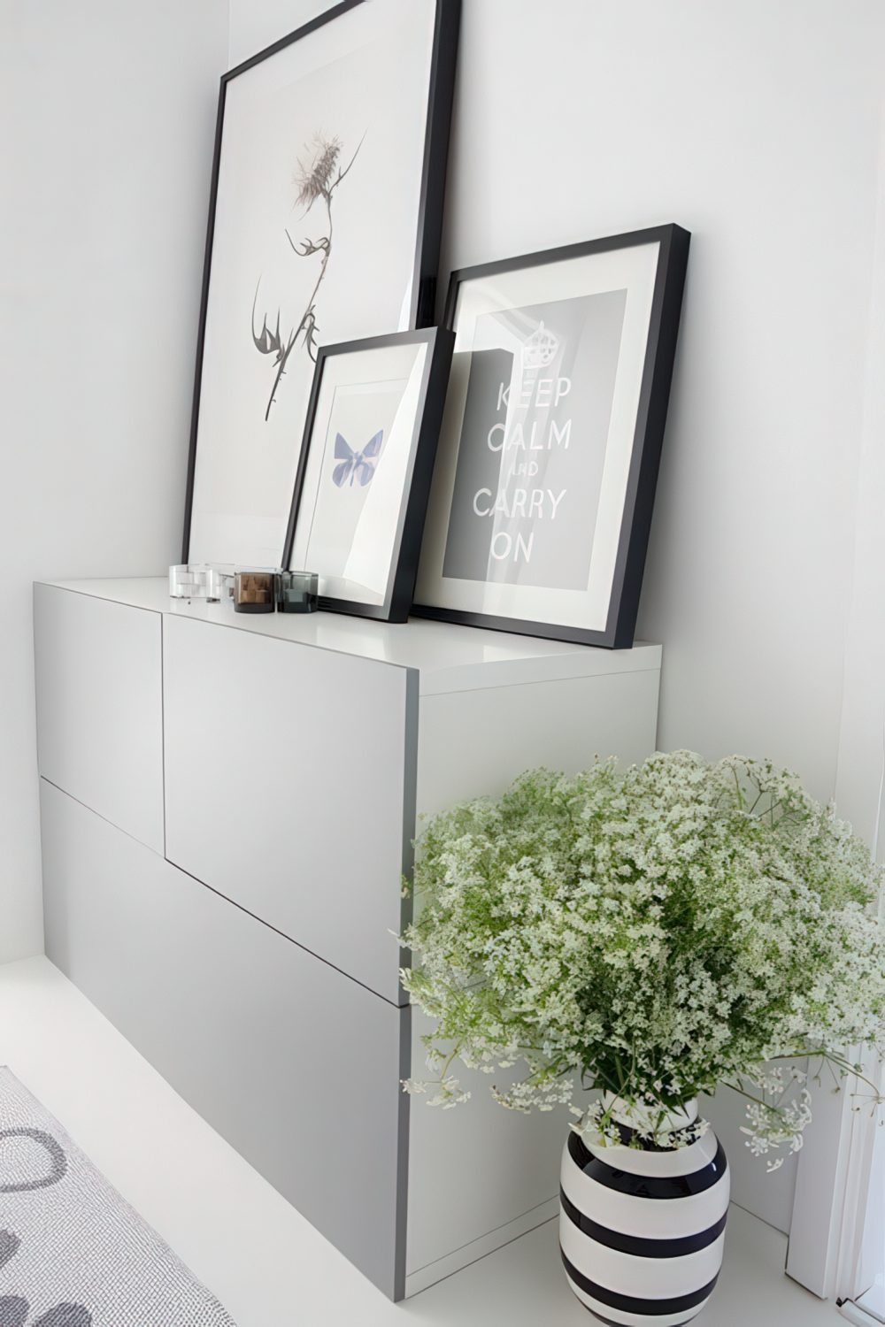 IKEA Besta with gray doors on a floor.