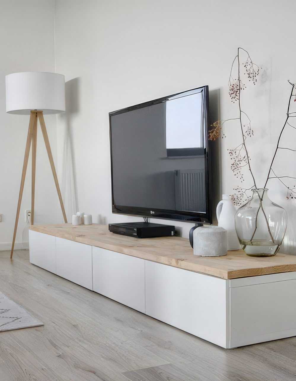 Short IKEA Besta storage unit in a living room.