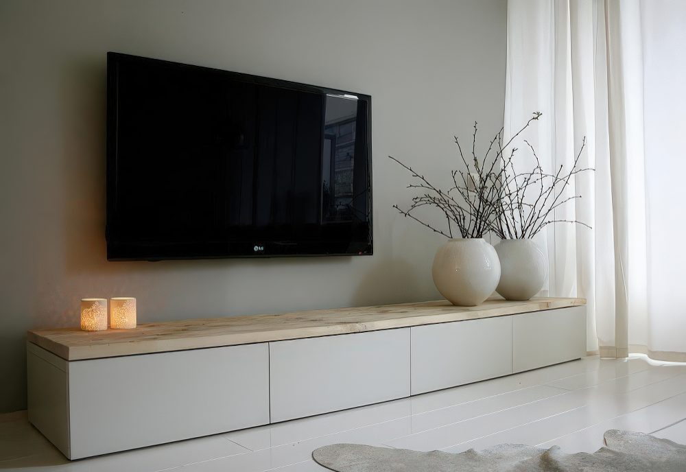 Short IKEA Besta unit on a floor but with wooden tabletop.